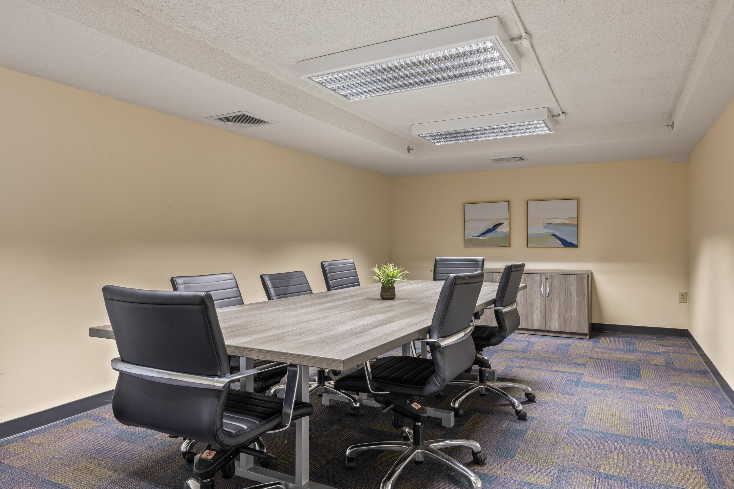 Small Business Center shared conference room with large table and chairs